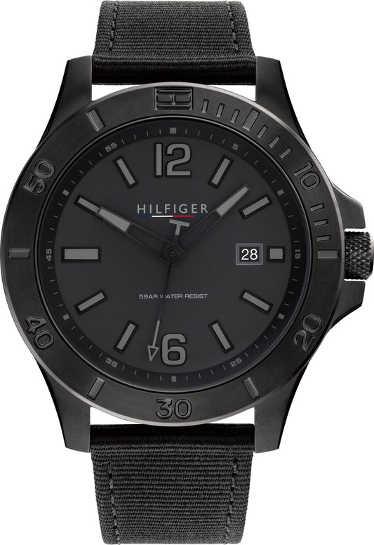Tommy Hilfiger 1791993 watch for man with a black dial and fabric strap.