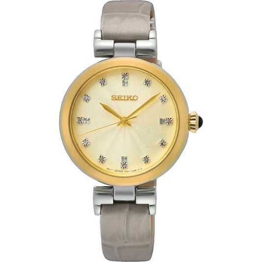 Seiko SRZ546P1 watch for women with a golden dial and leather strap.